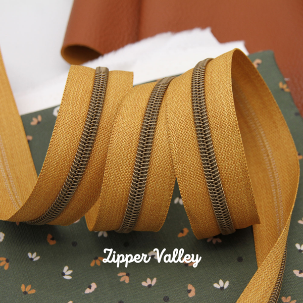 Goldie Jean - Size #5 BRONZE Nylon Coil Zipper Tape - pkg of 3 yards
